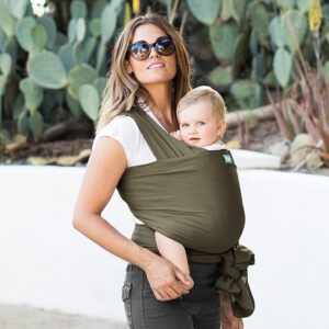 Mom wearing her baby in a wrap carrier