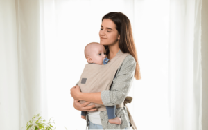 Mom wearing her baby in a pre wrapped carrier