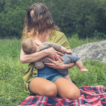 A Mom breastfeeding her baby in public