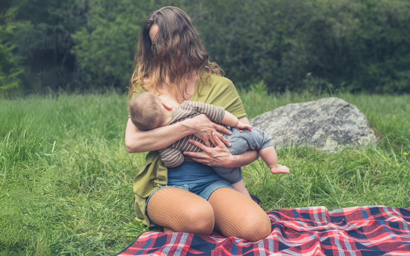 A Mom breastfeeding her baby in public