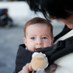 mom wearing her baby with Ergobaby Omni Breeze