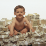 Baby sitting on a pile of money