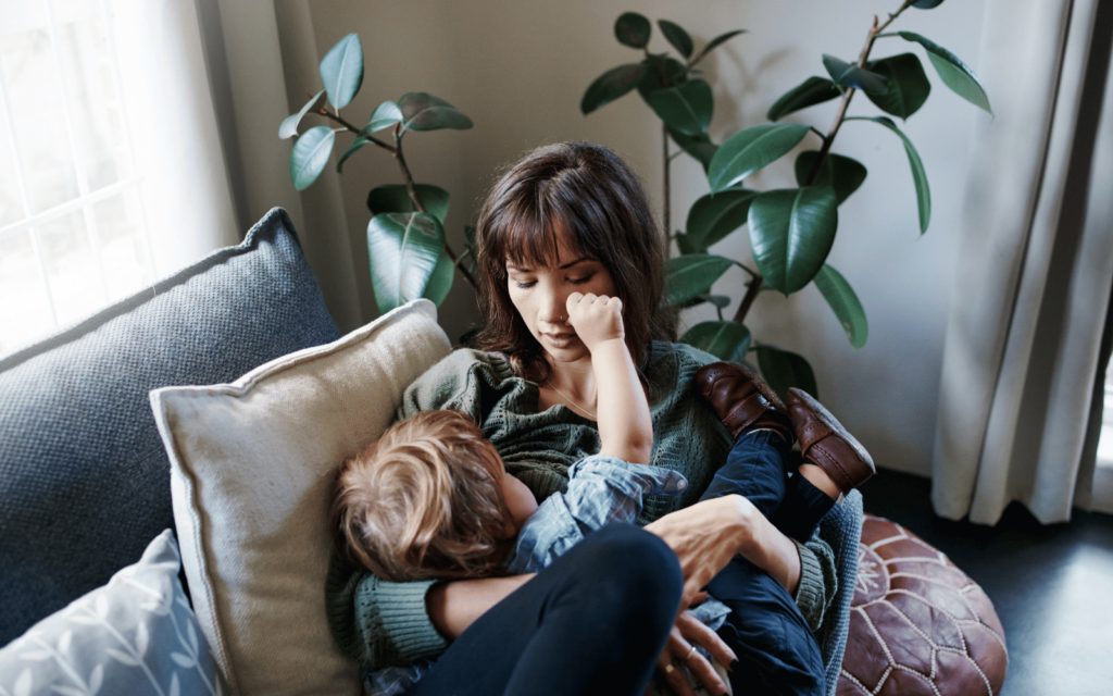 mom breastfeeding a toddler 