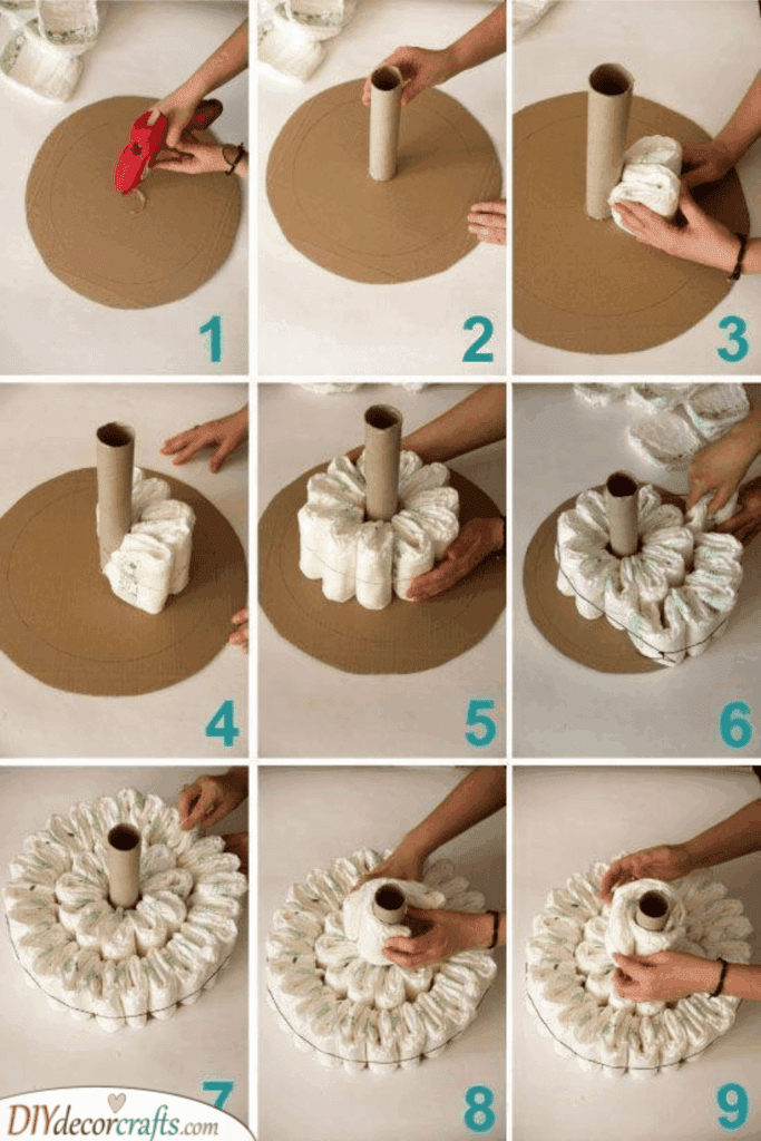 Adjust the top diaper to stand up straight so your second and third tiers are neat and stable.
